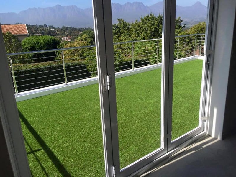 Artificial grass installation on a balcony in Cape Town